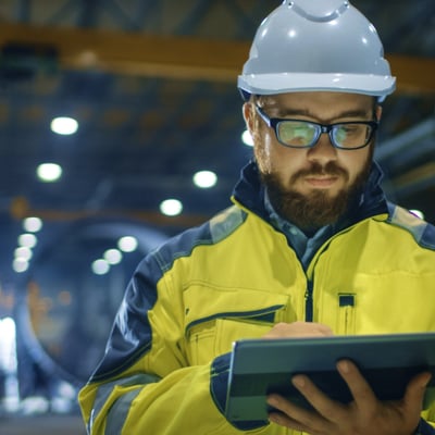 Factory worker with a tablet