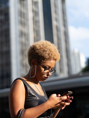 woman looking at phone